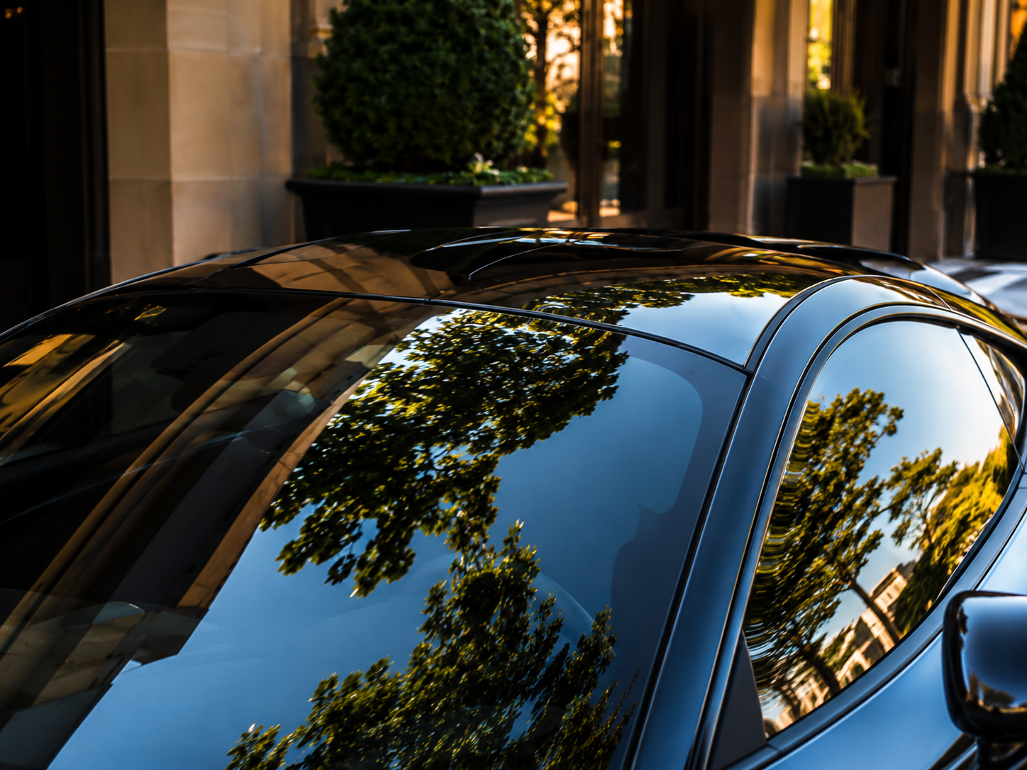 Illustration of a clean car parked in a driveway